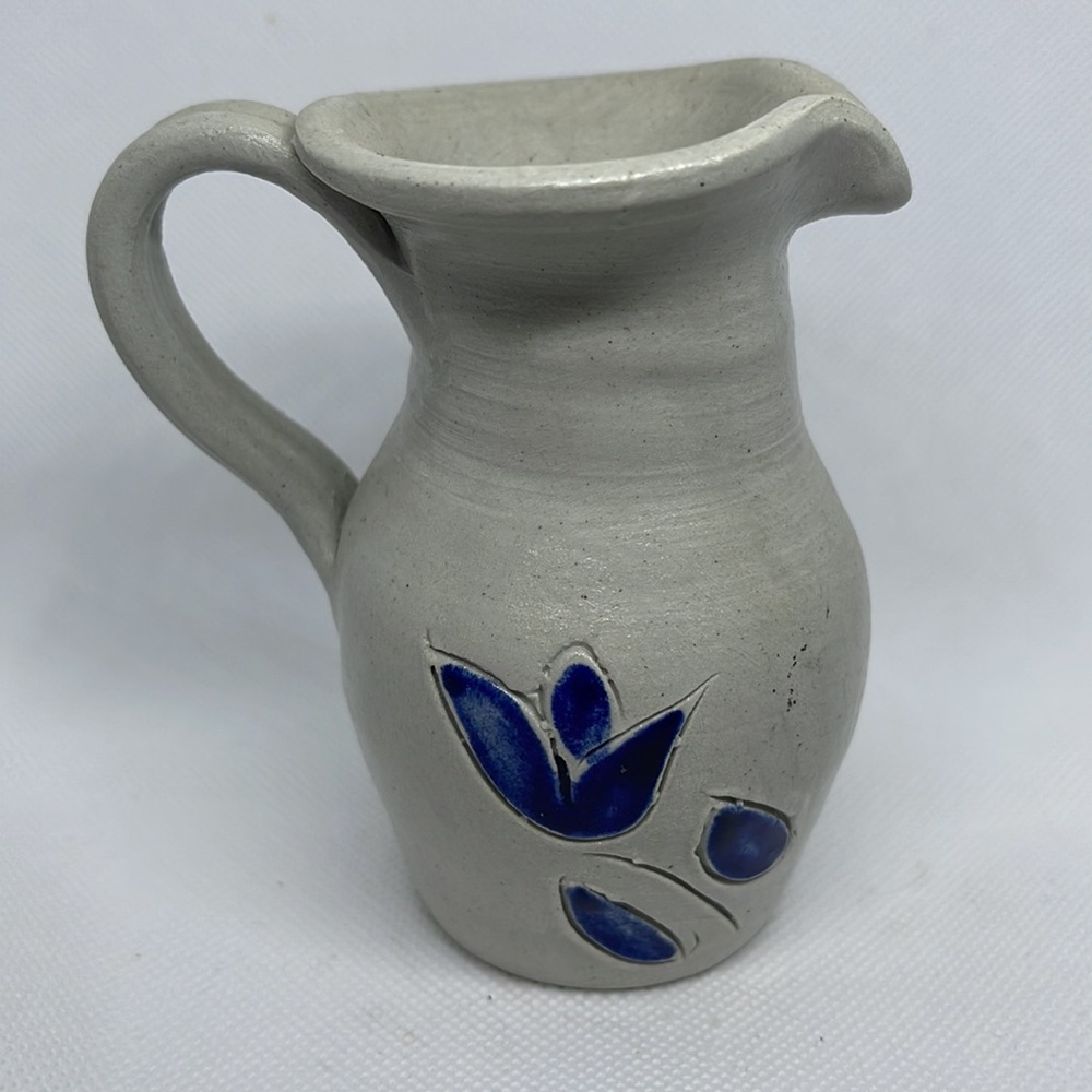 Vintage handthrown salt-glazed cream jug or syrup pitcher.